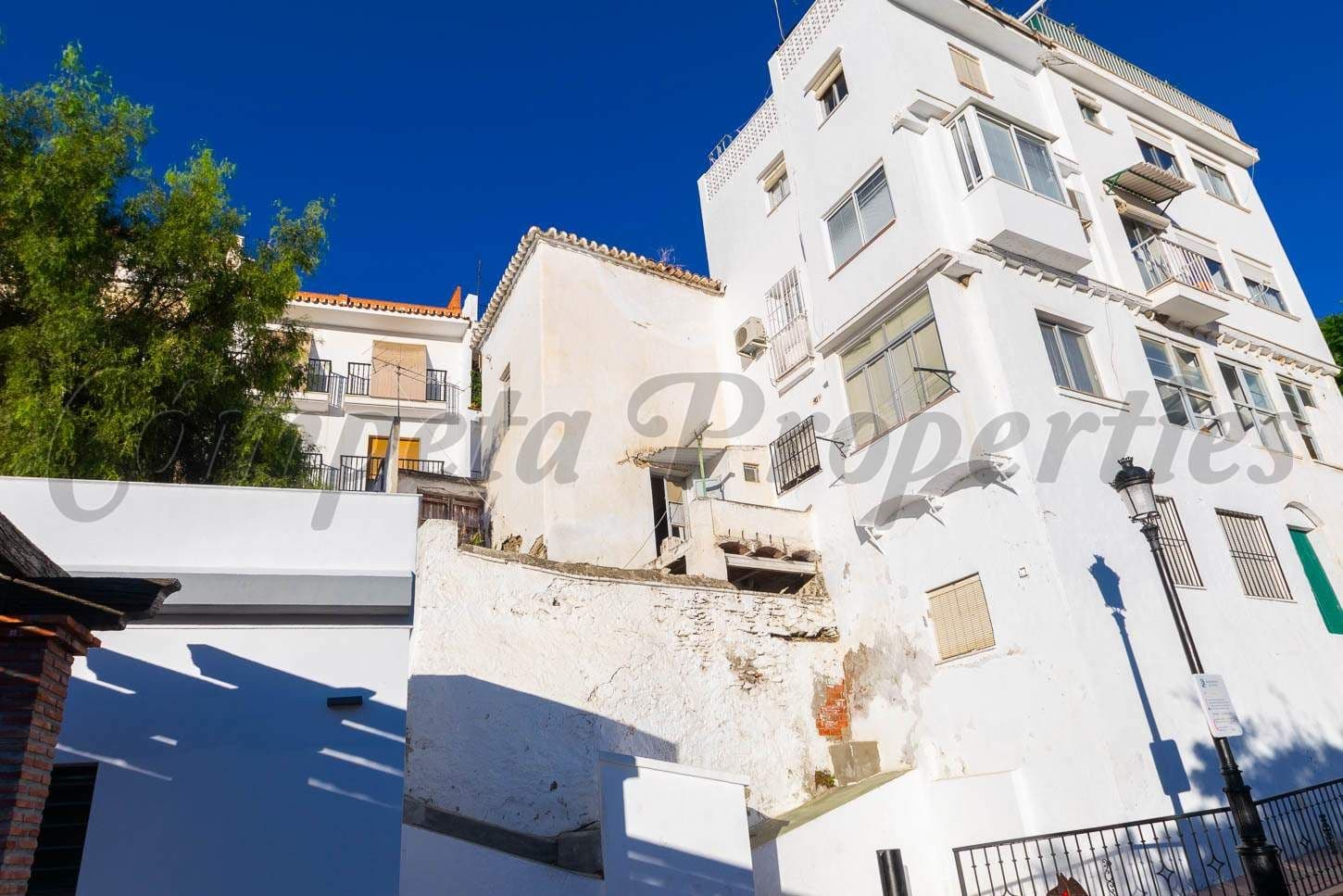 Foto 3 van 10 — Huis in Torrox · Torrox